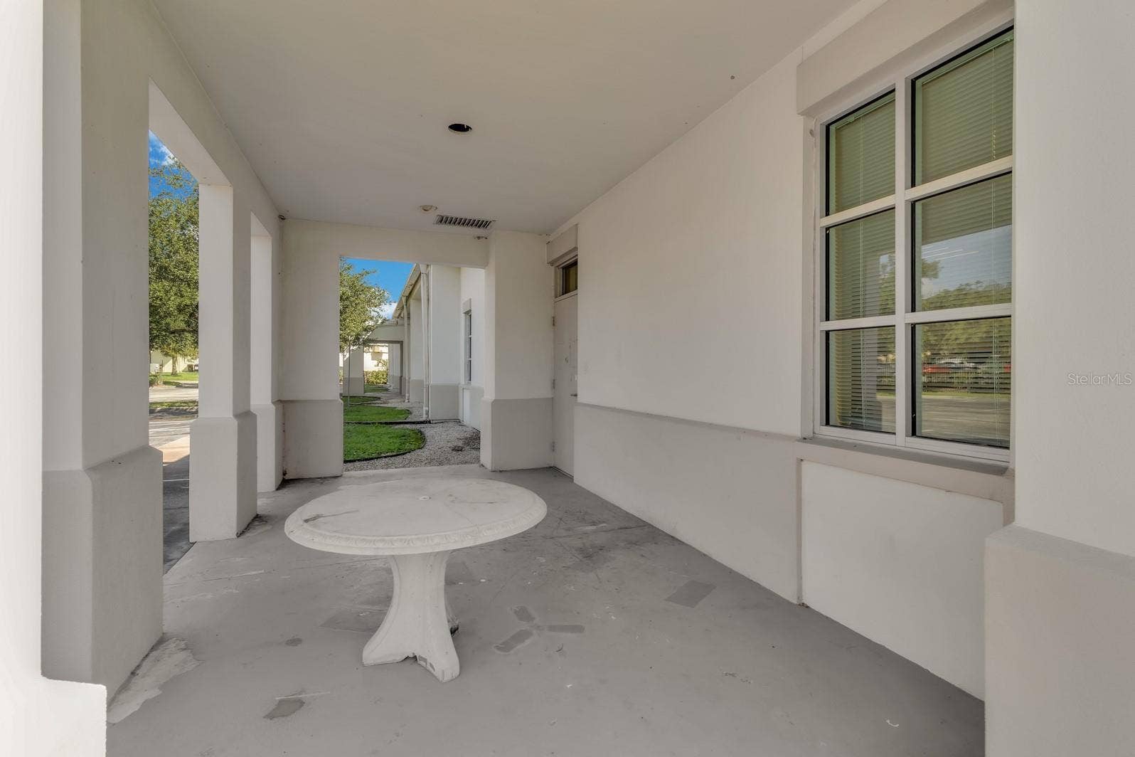1201 E OAK STREET, Kissimmee, FL 34744 Covered Space in Back of Building