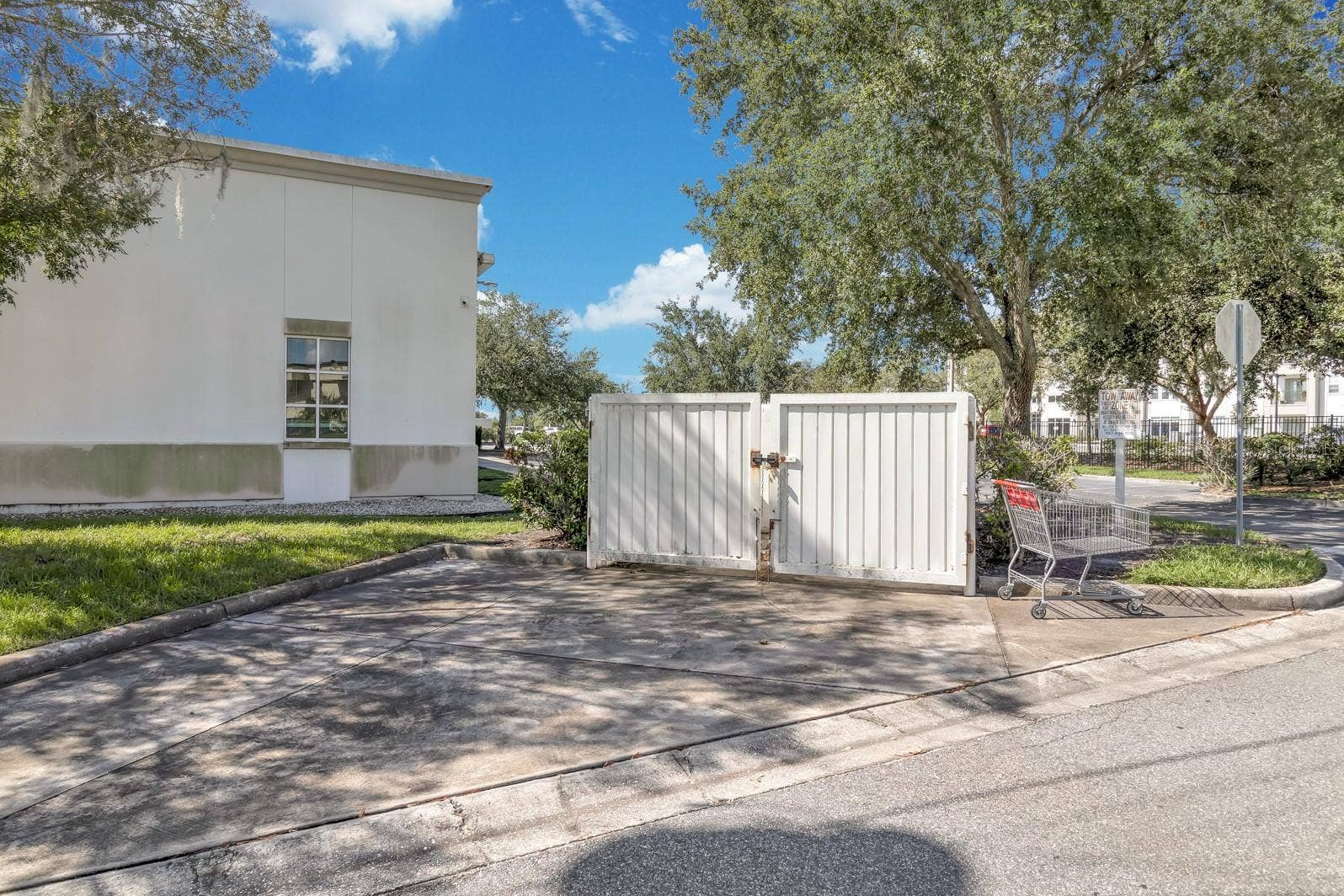 1201 E OAK STREET, Kissimmee, FL 34744 Back of Building / Dumpster Area