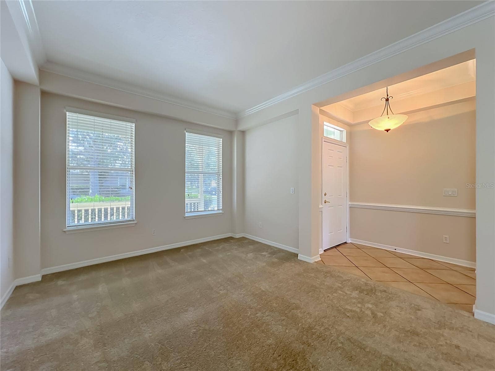 12809 HOLDENBURY LANE, Windermere, FL 34786 Tiled Front entry. Crown molding, freshly painted, new carpets in Living room area