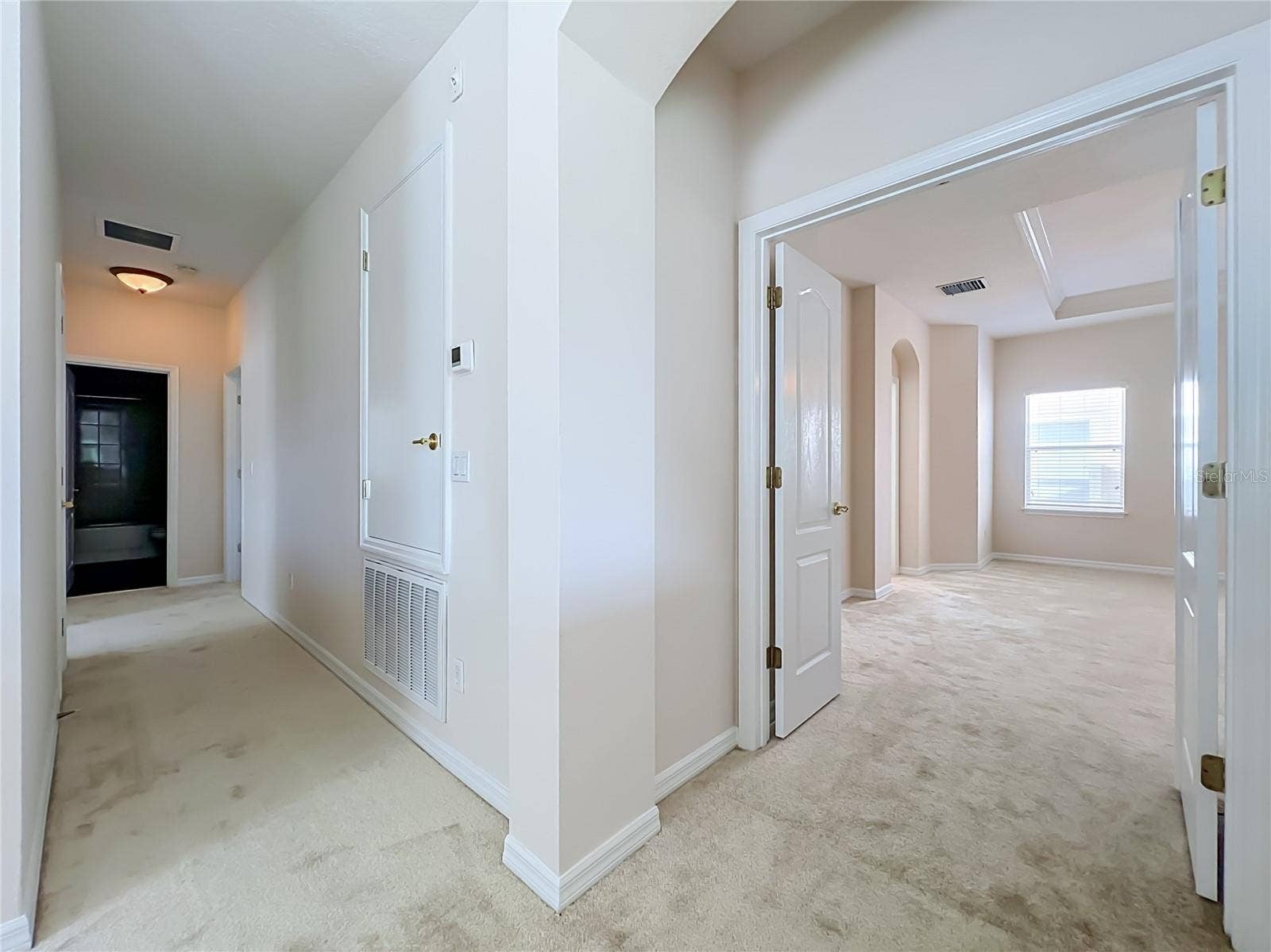 12809 HOLDENBURY LANE, Windermere, FL 34786 Primary bedroom with french door entry