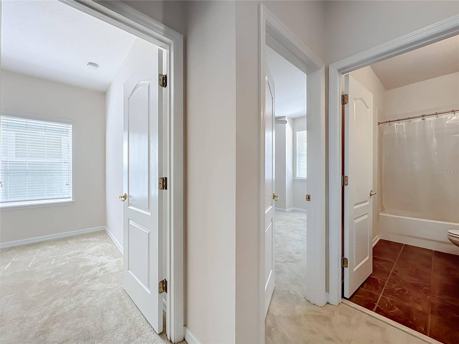 12809 HOLDENBURY LANE, Windermere, FL 34786 3 bedrooms at the end of the hall, and hall bath