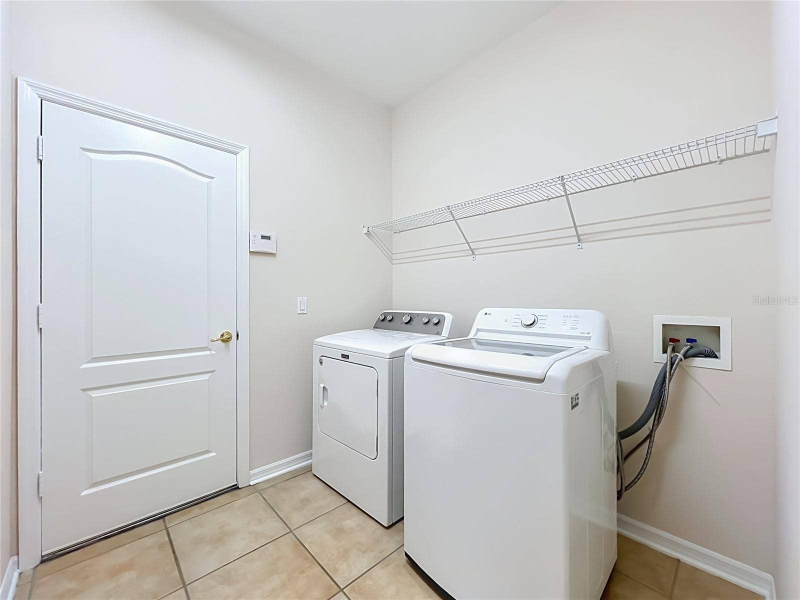 12809 HOLDENBURY LANE, Windermere, FL 34786 1st floor inside laundry.