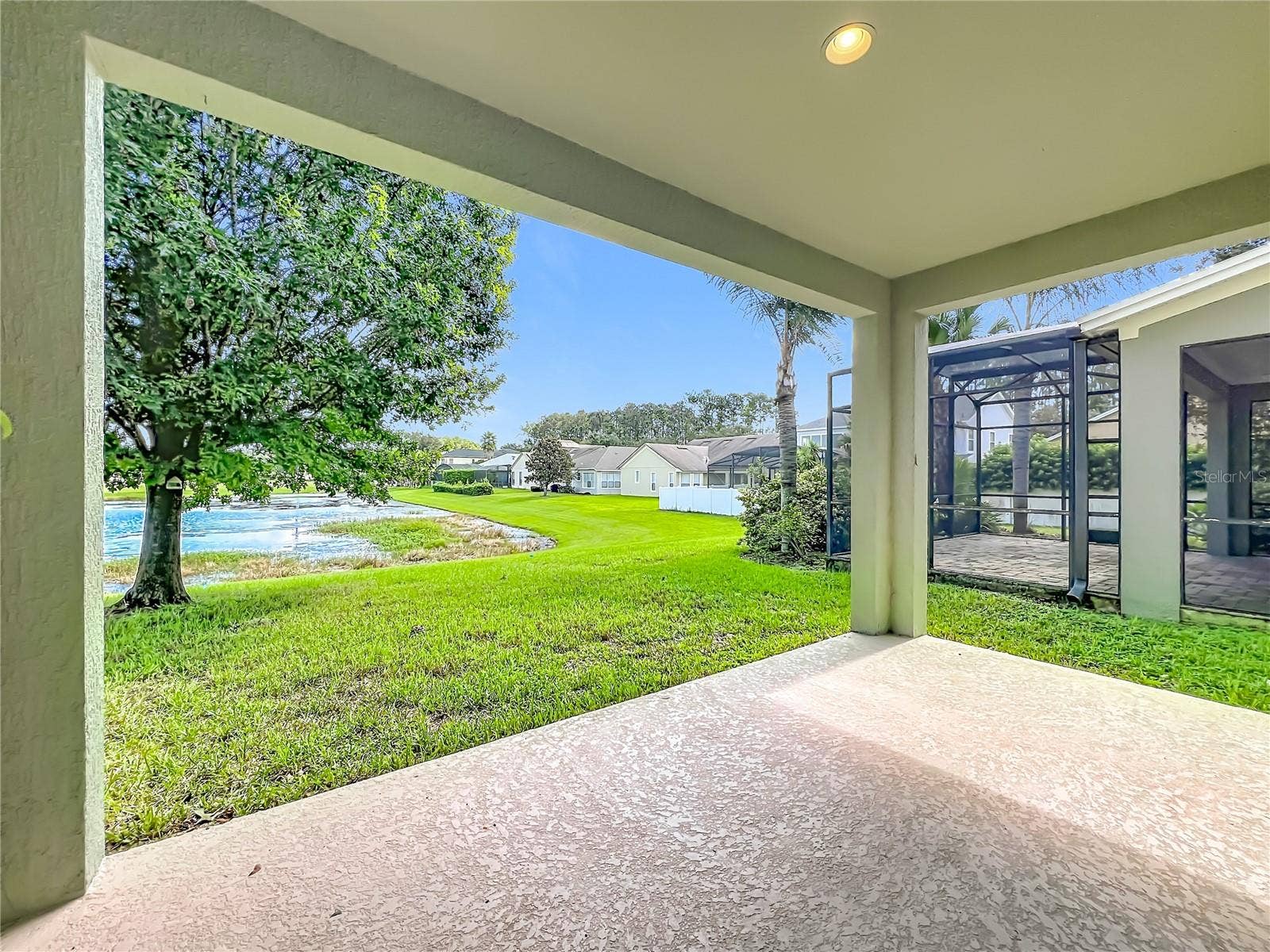 12809 HOLDENBURY LANE, Windermere, FL 34786 Covered Rear porch with pond view