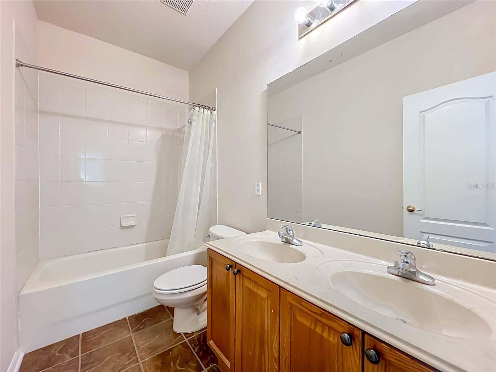 12809 HOLDENBURY LANE, Windermere, FL 34786 Hall closet features dual sinks