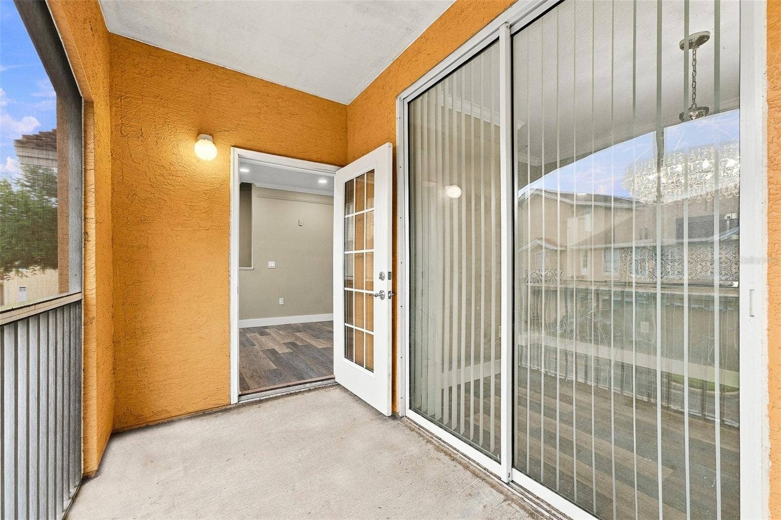 12020 VILLANOVA DRIVE, #107, Orlando, FL 32837 Second floor, screened porch.