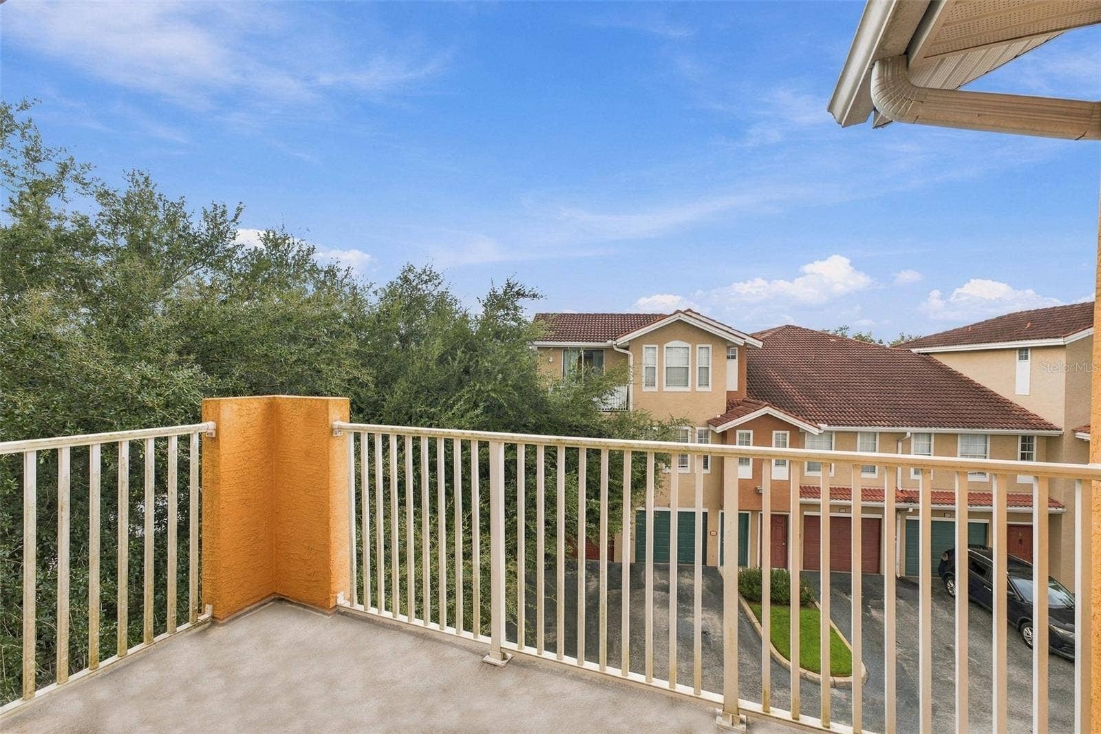 12020 VILLANOVA DRIVE, #107, Orlando, FL 32837 Third-floor uncovered balcony.