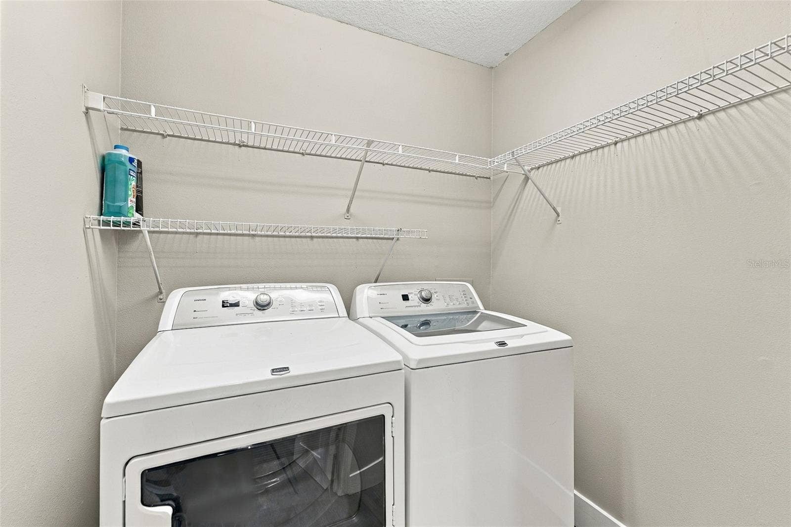 12020 VILLANOVA DRIVE, #107, Orlando, FL 32837 Laundry room.