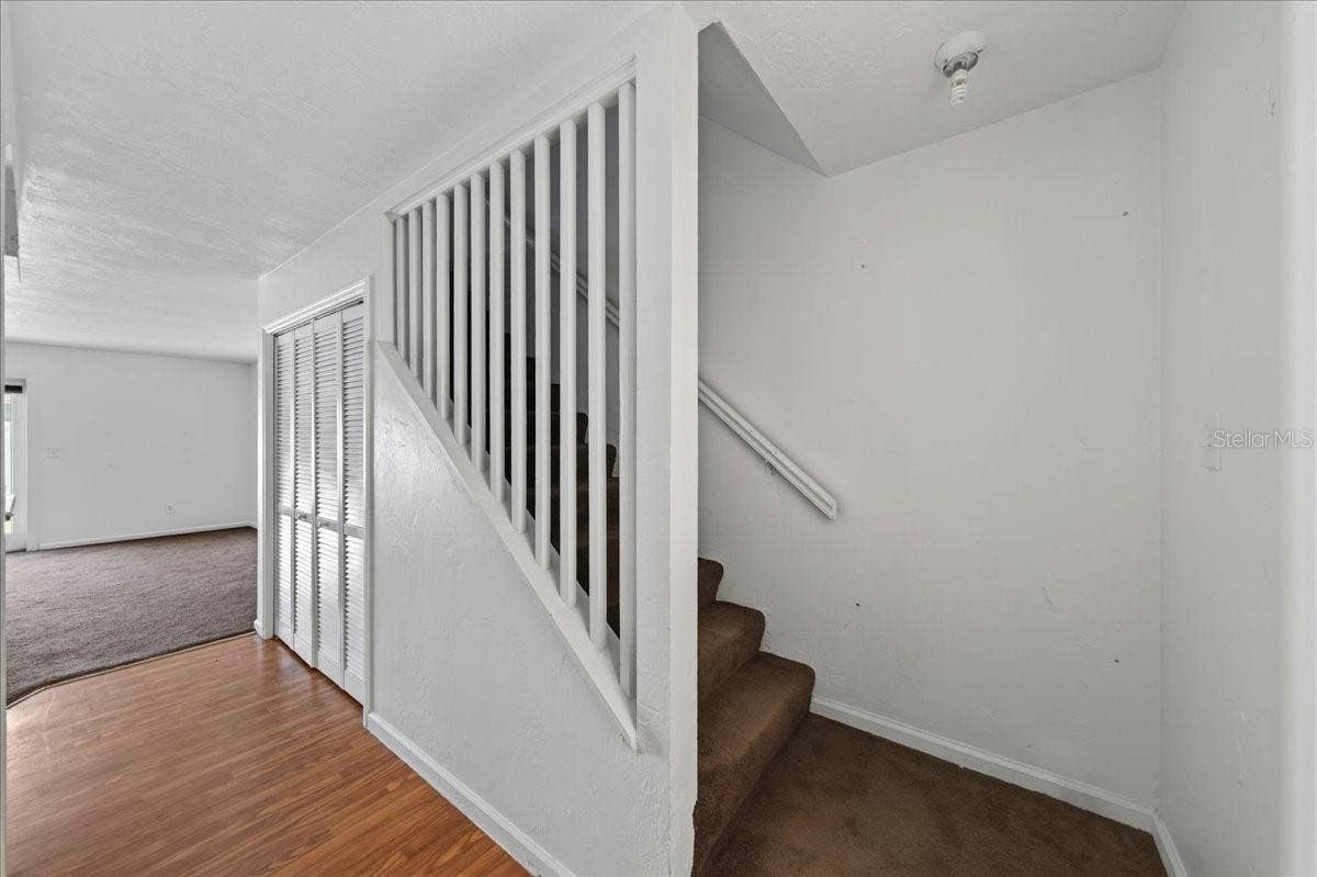 Unit 845 Foyer and view of stairs