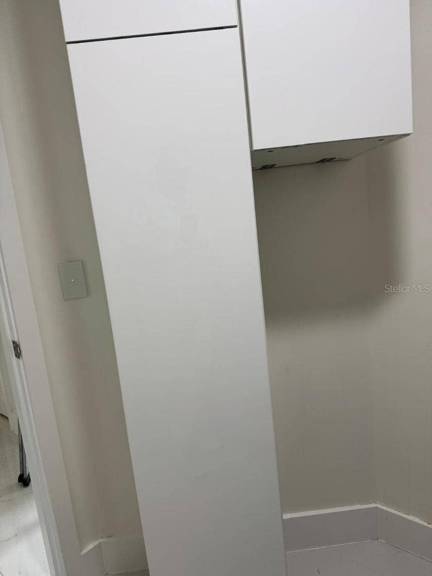 6013 FENDER COURT, Orlando, FL 32837 LAUNDRY ROOM, SECOND FLOOR.