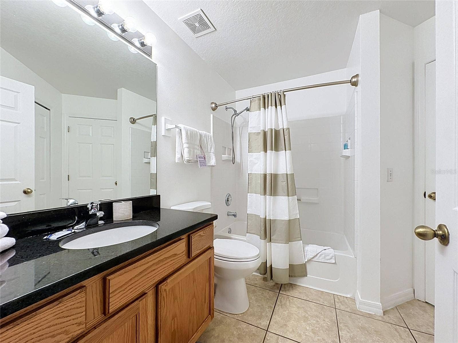 3029 BARBADOS LN, Haines City, FL 33844 Full Hall Bathroom #3