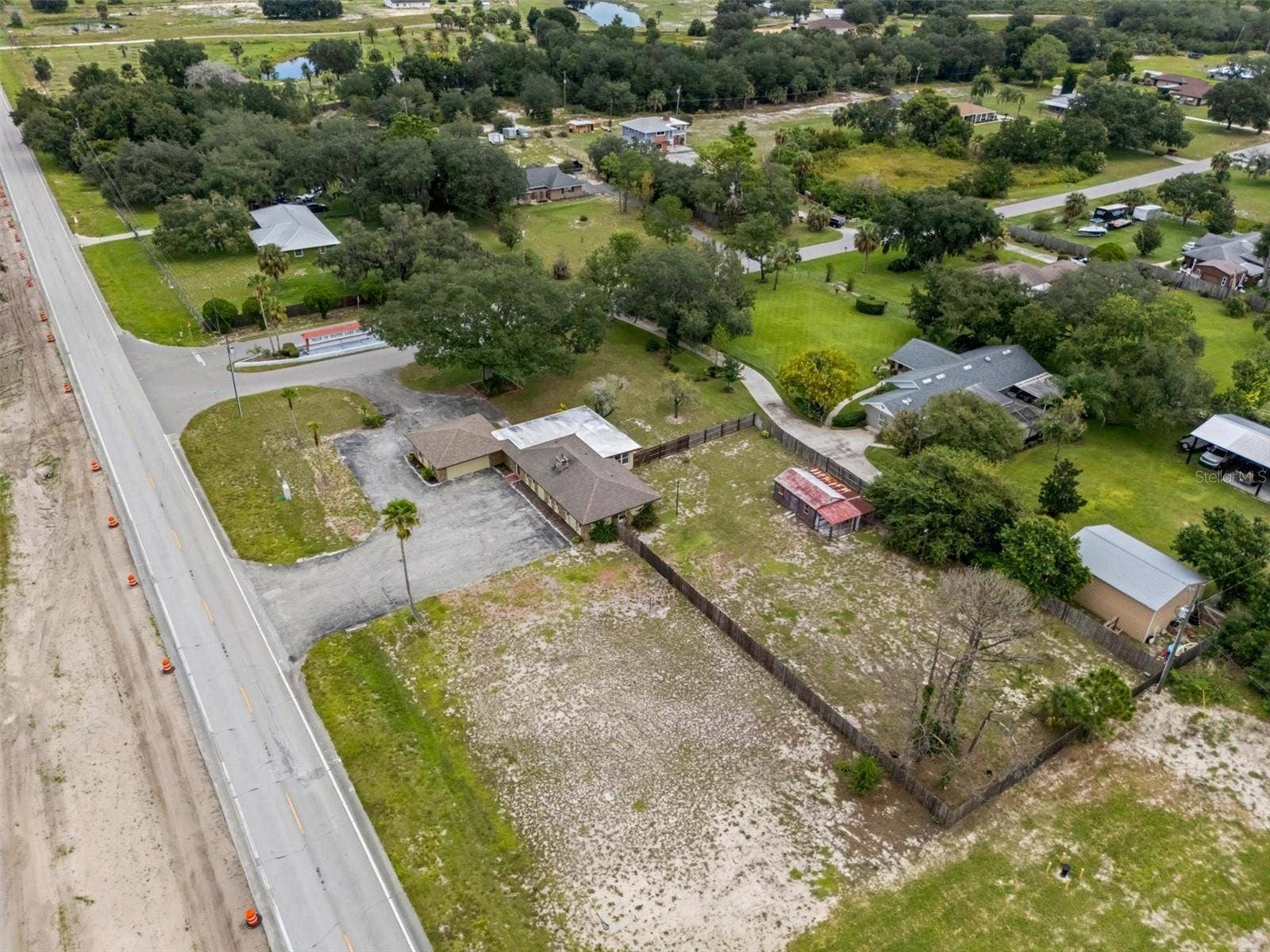 Aerial showing the fenced backyard