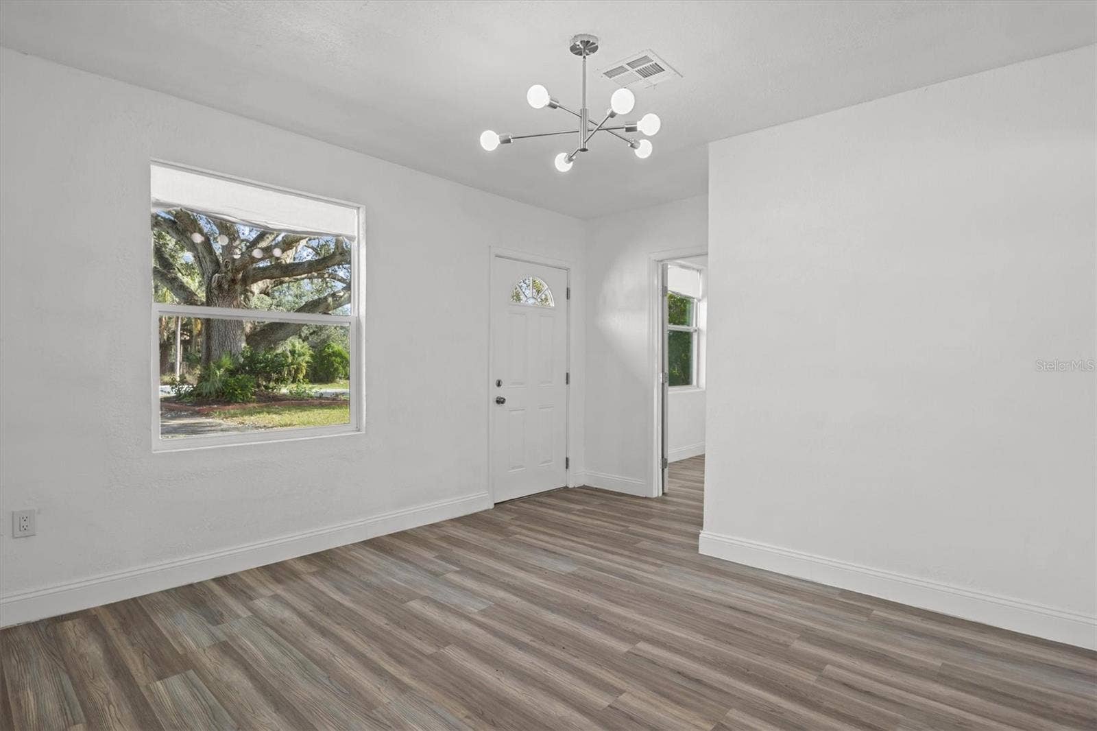 Living Room - Luxury Vinyl Flooring Throughout