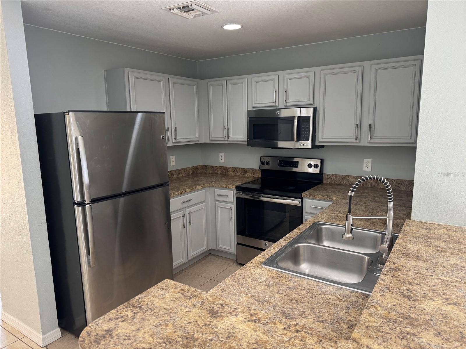 812 HAMSTER PLACE, Poinciana, FL 34759