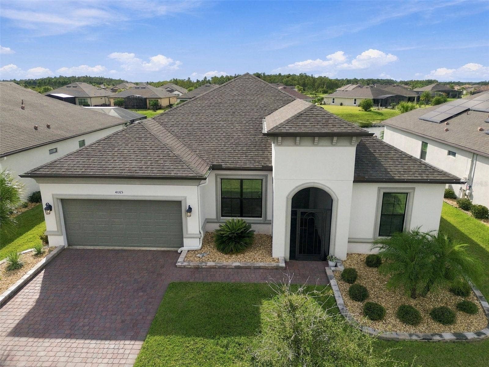 4085 VIA TOLEDO COURT, Poinciana, FL 34759 Professionally landscaped