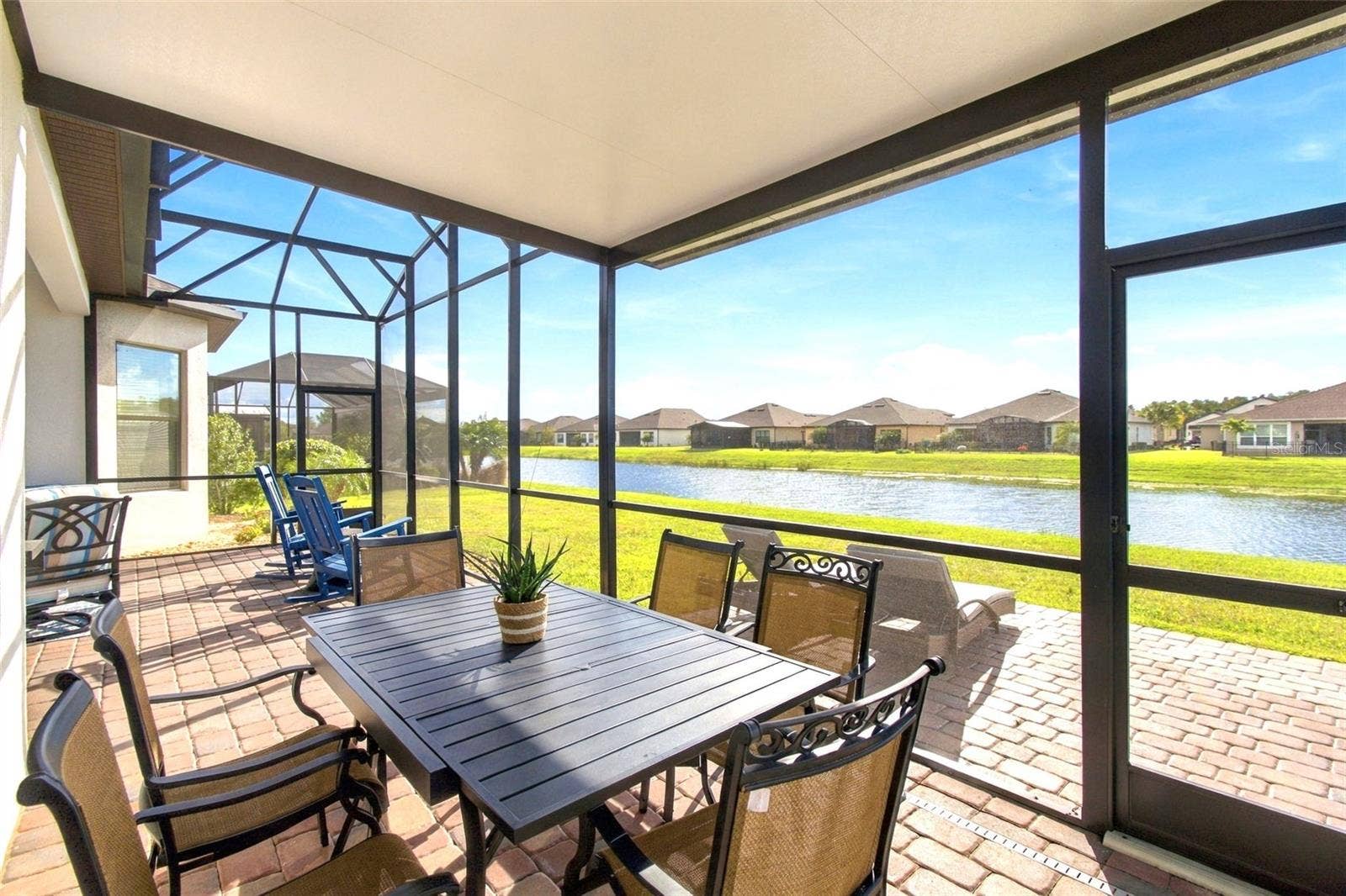 4085 VIA TOLEDO COURT, Poinciana, FL 34759 Covered Dining Patio