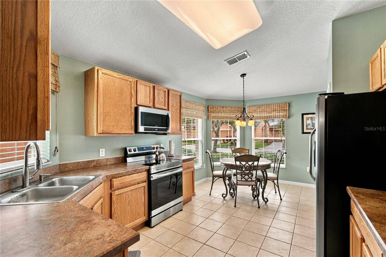 516 GRAND CANAL DR, Poinciana, FL 34759 CERAMIC TILE FLOORS
