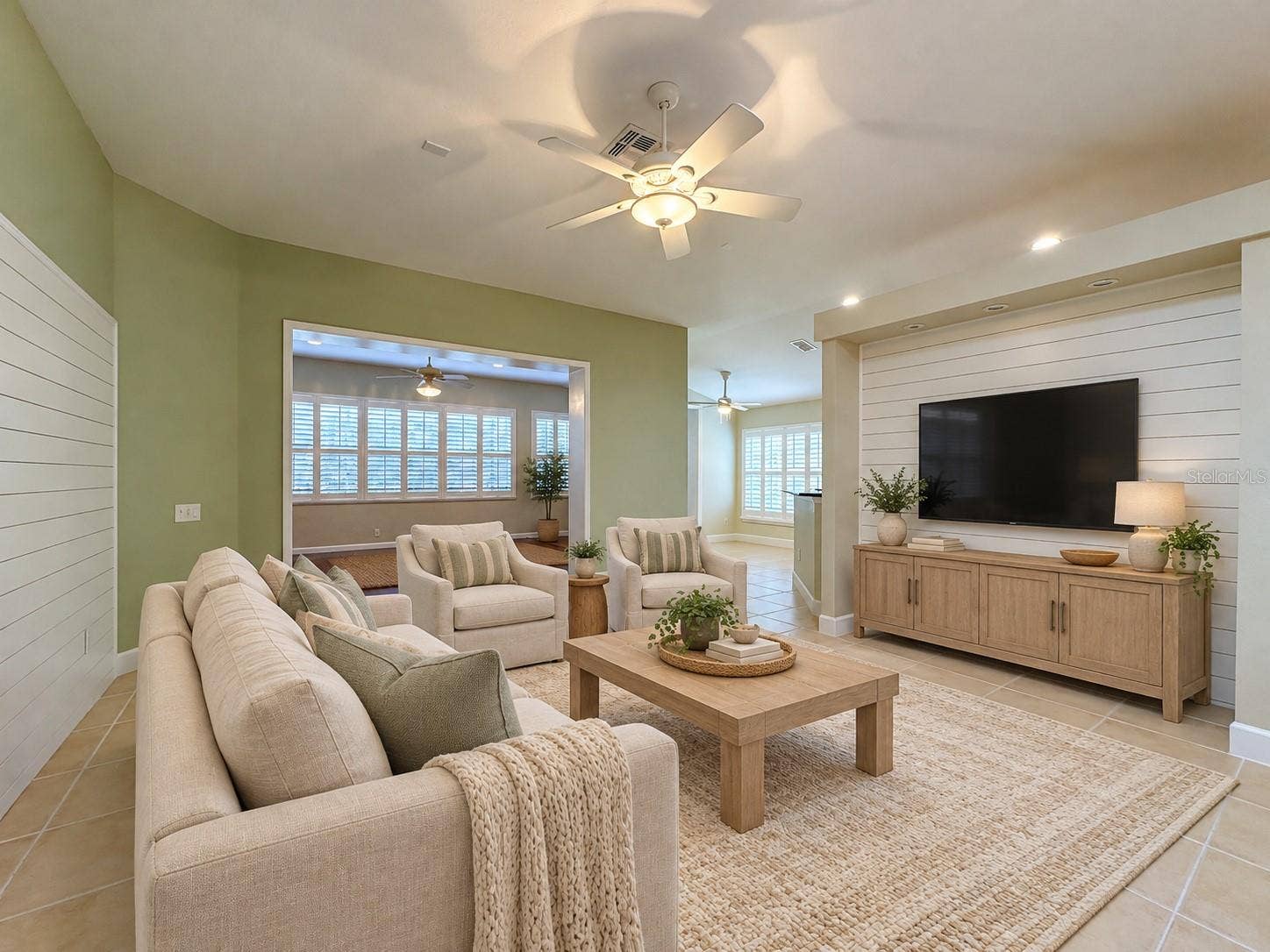 516 PLAYA DR, Davenport, FL 33837 Family room staged