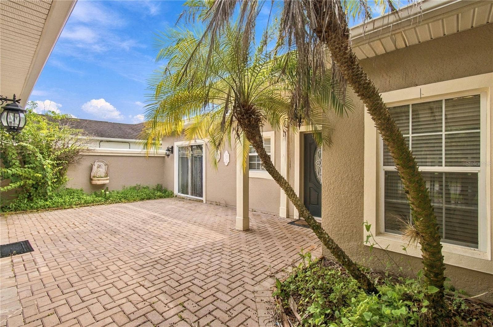 352 HAMRICK DR, Poinciana, FL 34759 Private Courtyard