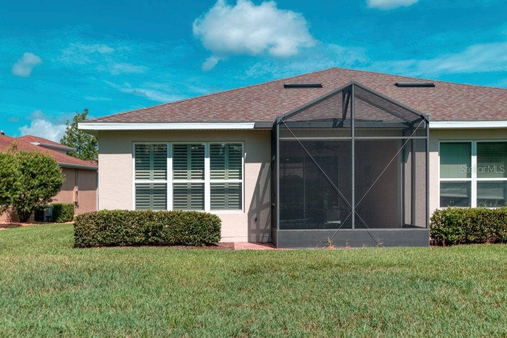 3432 FALLBROOK DRIVE, Poinciana, FL 34759 REAR View of Screened Lanai