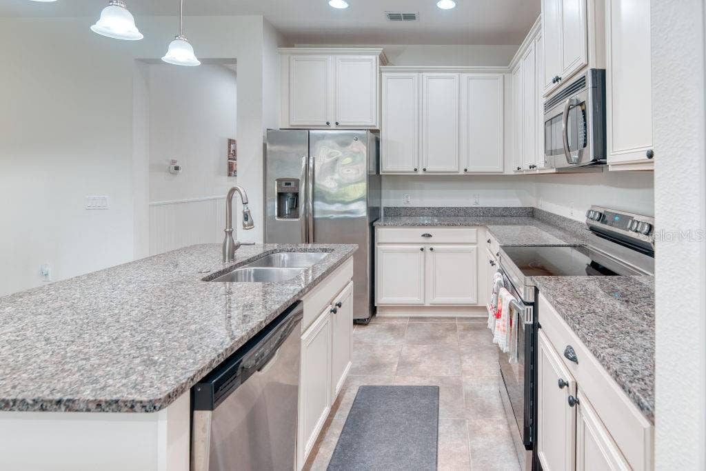 3432 FALLBROOK DRIVE, Poinciana, FL 34759 Kitchen with Stainless Steel Appliances