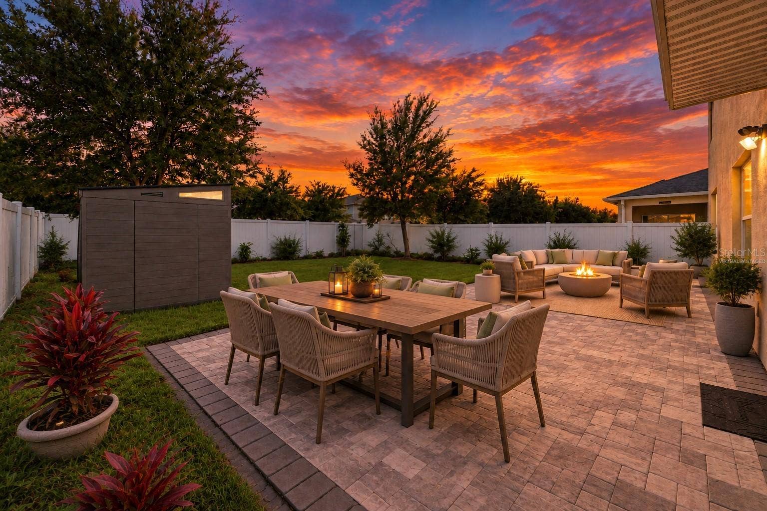 1894 CASSIDY KNOLL DRIVE, Kissimmee, FL 34744 VIRTUALLY STAGED FURNISHINGS AND SUNSET.