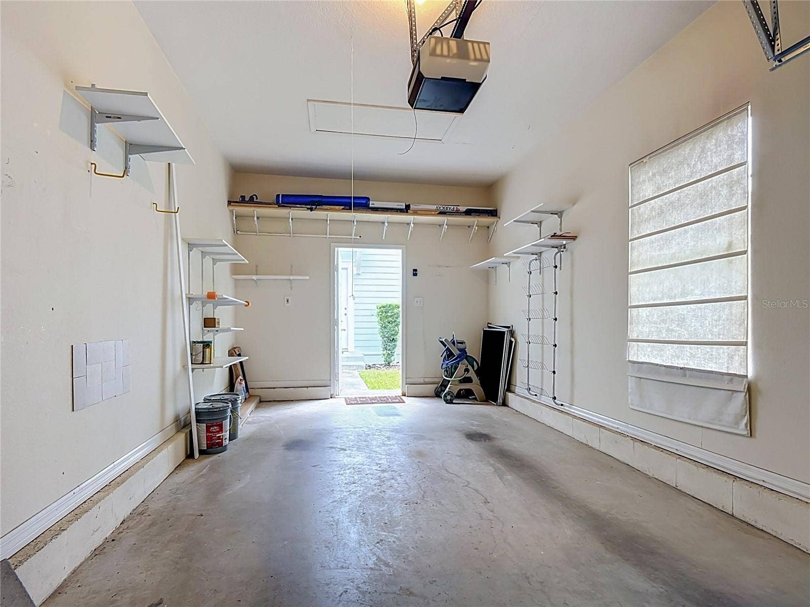 1003 OLD BLUSH ROAD, Celebration, FL 34747 Garage with Shelving