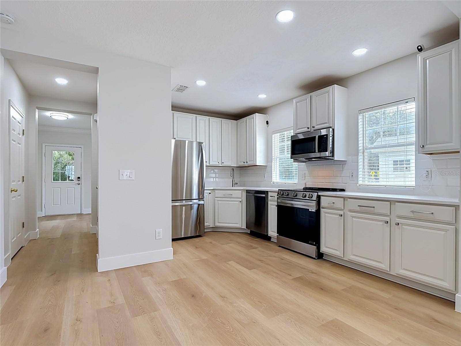 1003 OLD BLUSH ROAD, Celebration, FL 34747 Hallway to Remodeled Kitchen