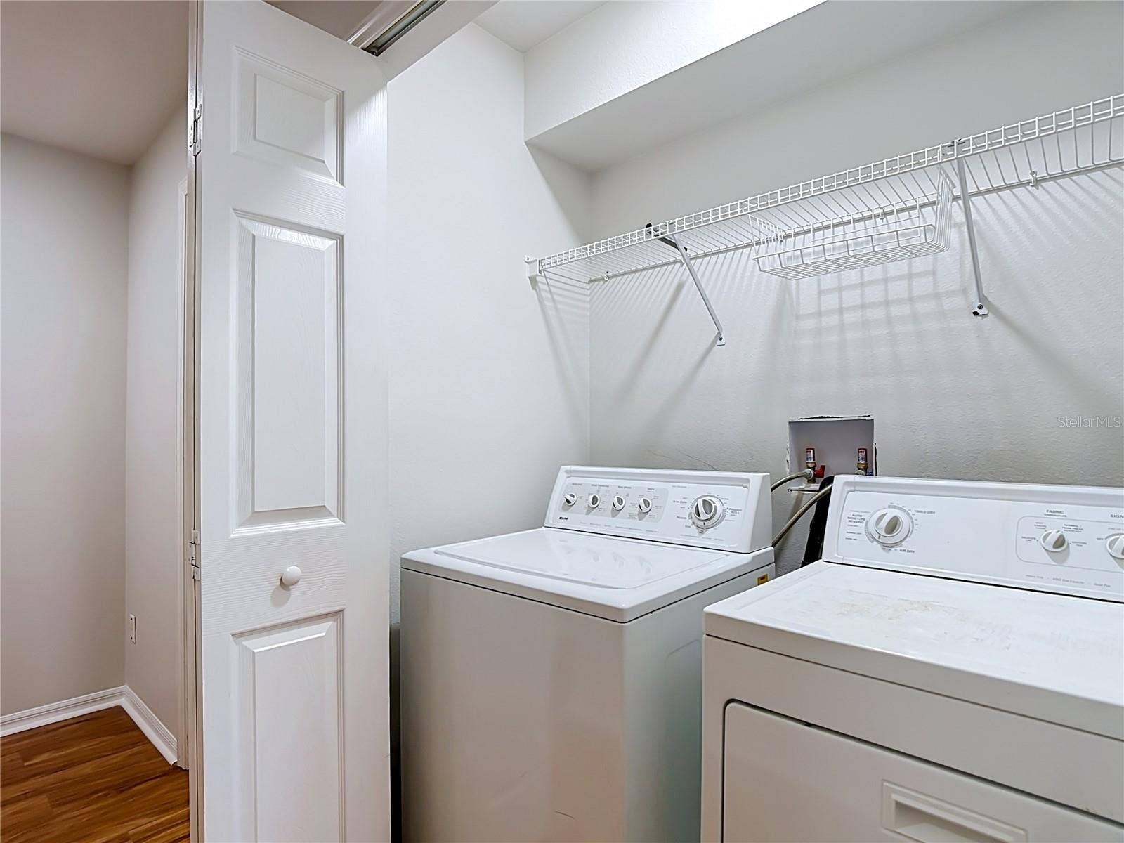 1003 OLD BLUSH ROAD, Celebration, FL 34747 Laundry Closet between both bedrooms