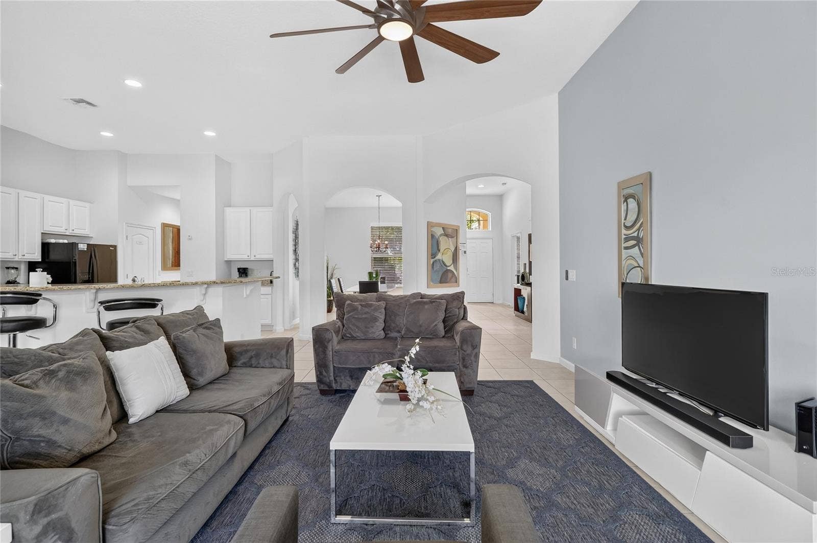 277 YELLOW SNAPDRAGON DRIVE, Davenport, FL 33837 family room looking towards the front door