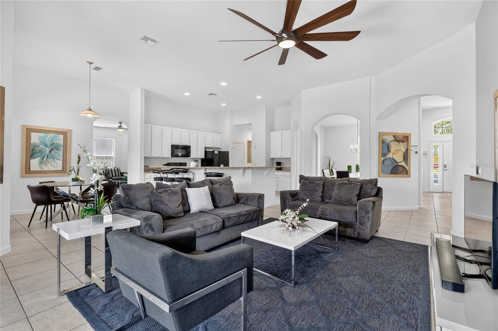 277 YELLOW SNAPDRAGON DRIVE, Davenport, FL 33837 Family room looking towards the kitchen