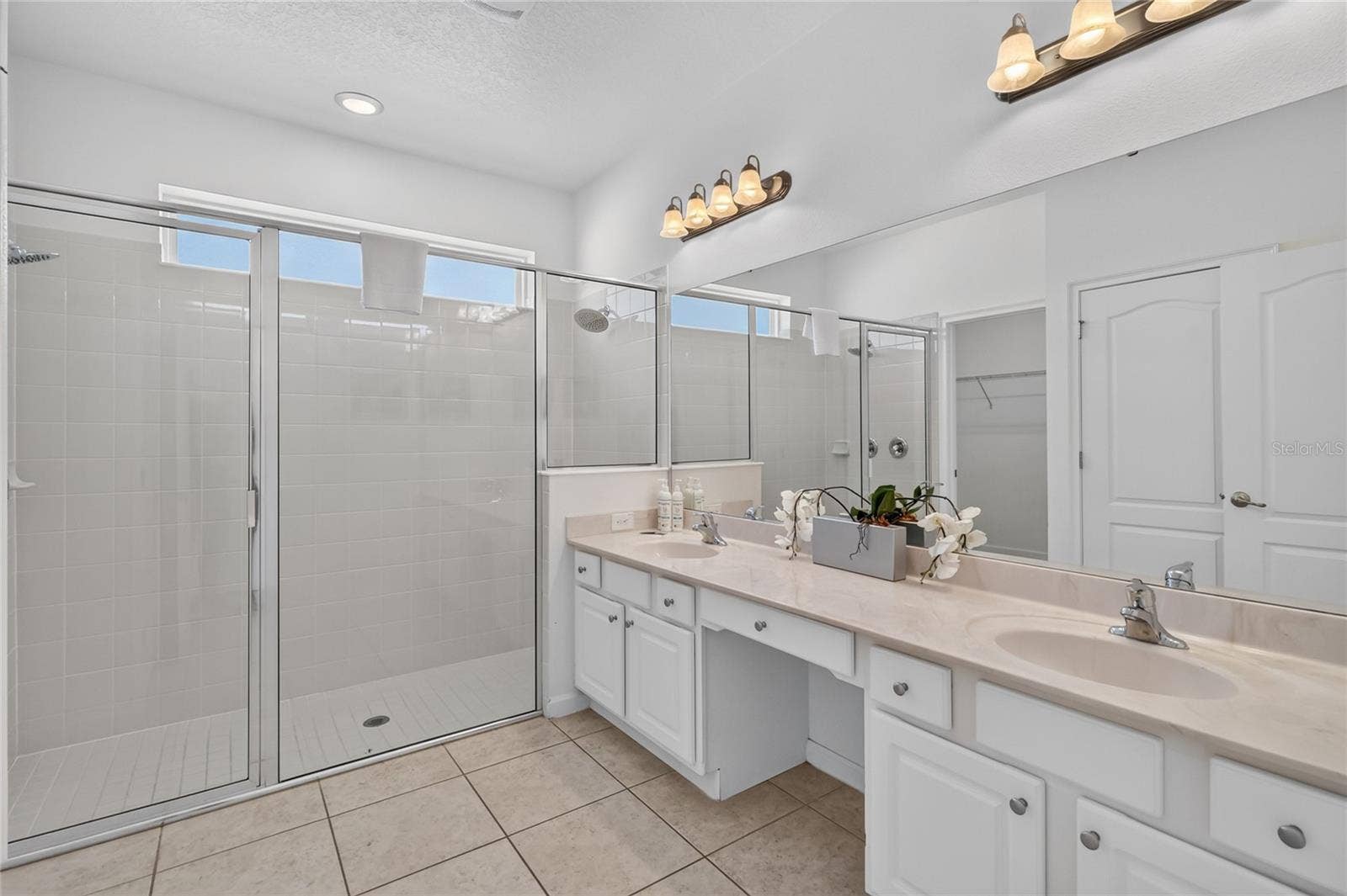 277 YELLOW SNAPDRAGON DRIVE, Davenport, FL 33837 Ensuite bathroom with double sinks
