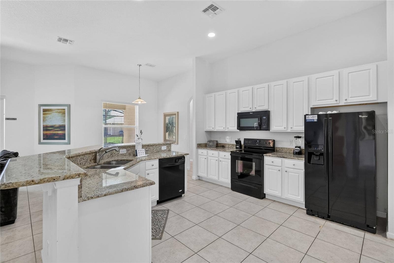 277 YELLOW SNAPDRAGON DRIVE, Davenport, FL 33837 Large open concept kitchen with granite countertops