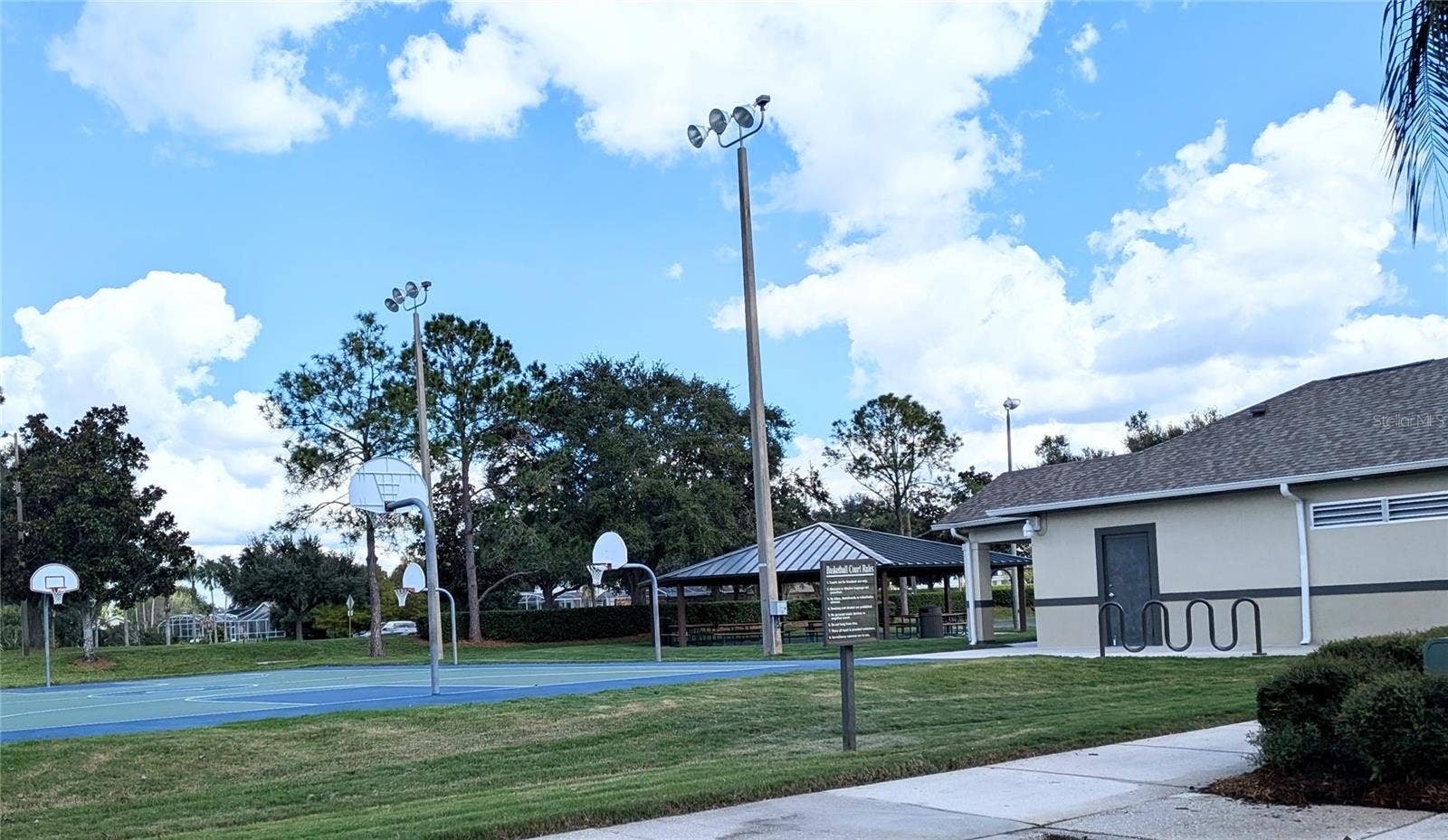 3514 OCITA DRIVE, Orlando, FL 32837 Osprey Park Community center and one of many basketball courts