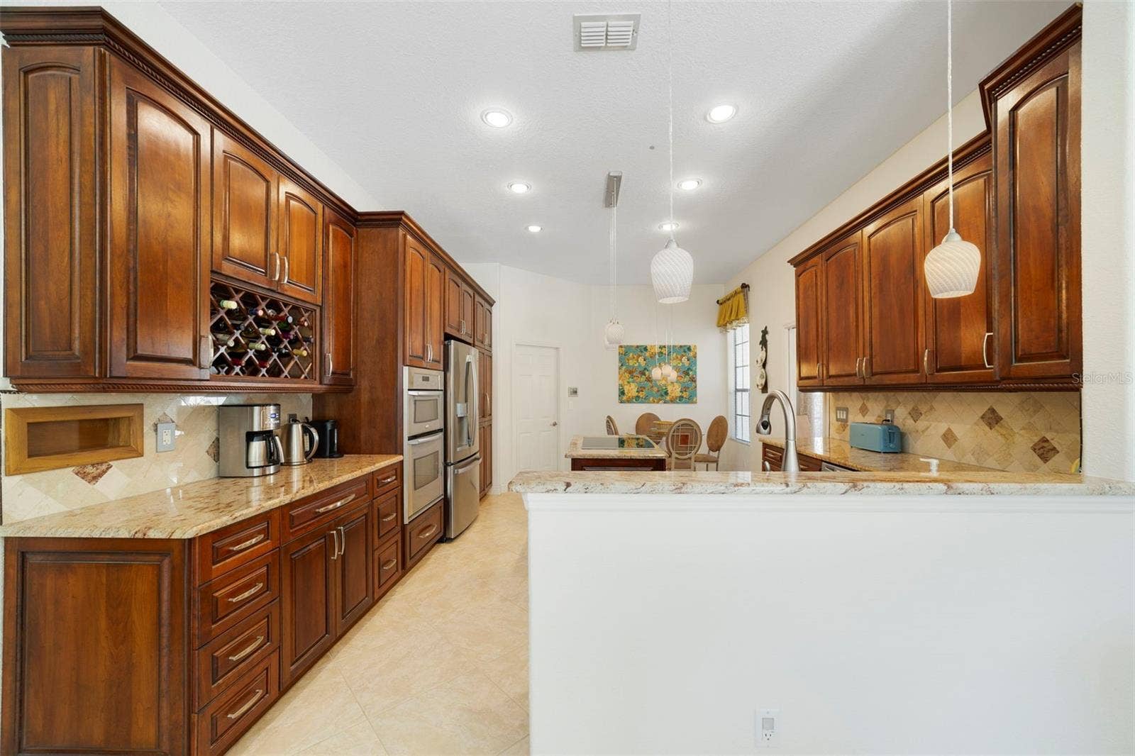 3514 OCITA DRIVE, Orlando, FL 32837 Wood cabinets with plenty of storage