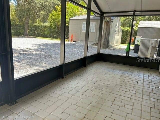1869 E LAKE DRIVE, Casselberry, FL 32707 enclosure back patio w/ pavers