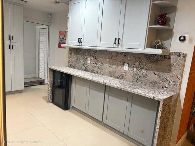 1869 E LAKE DRIVE, Casselberry, FL 32707 breeakfast area with wine cooler