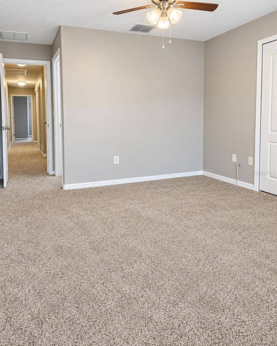 5481 LIMESTONE LANE, Lakeland, FL 33809 Master bedroom view from corner window