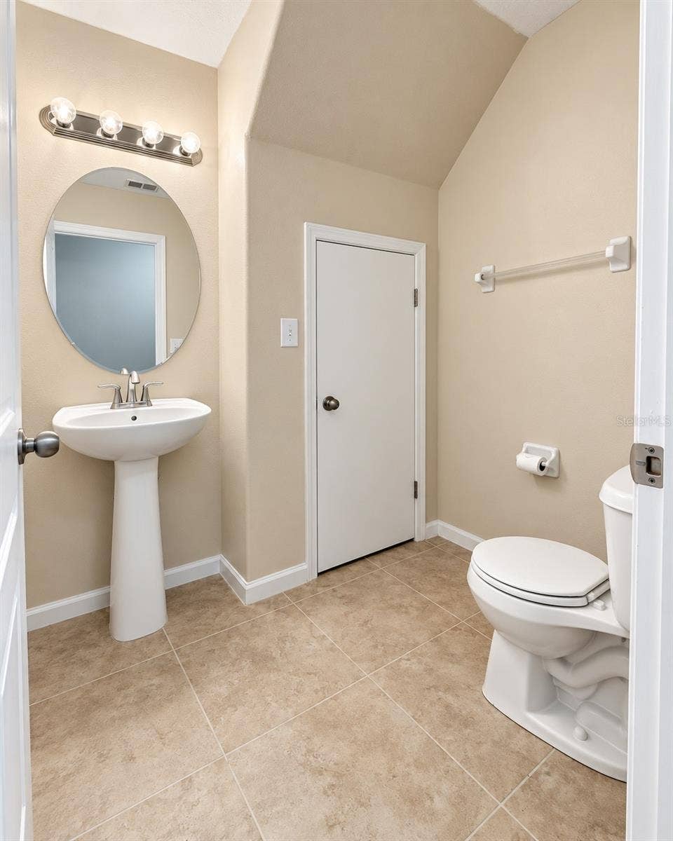 5481 LIMESTONE LANE, Lakeland, FL 33809 Half Downstairs Bathroom with storage