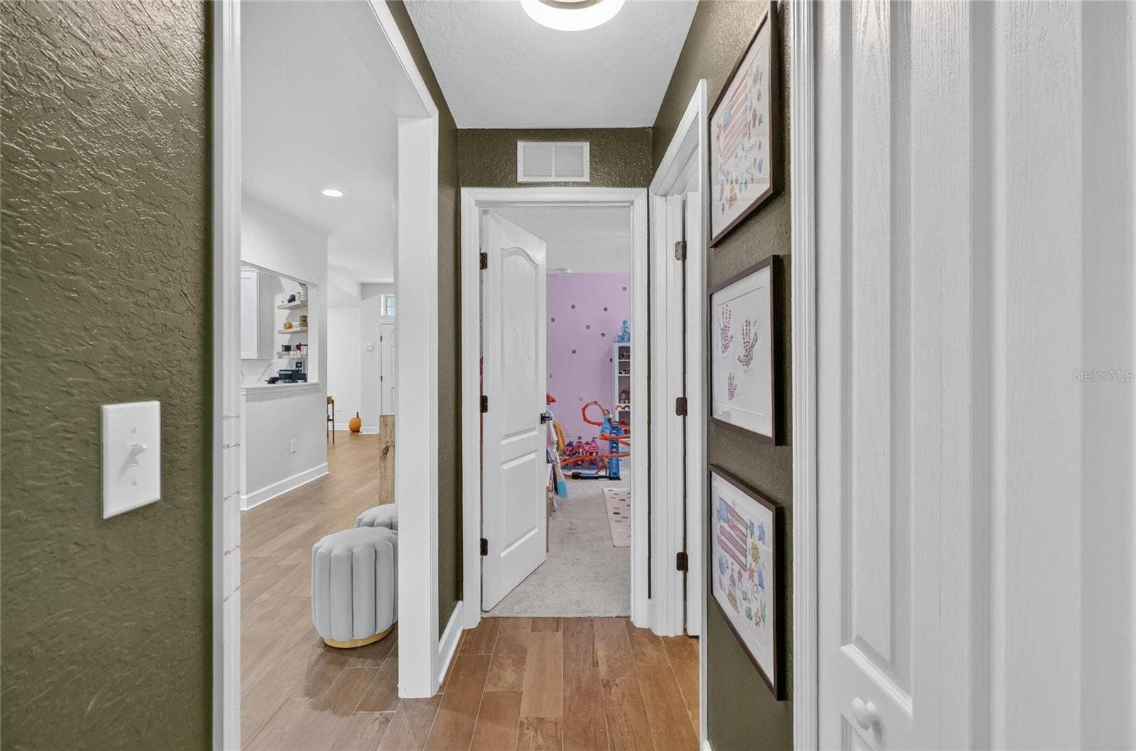Looking towards the 3rd bedroom which is currently being used as a playroom