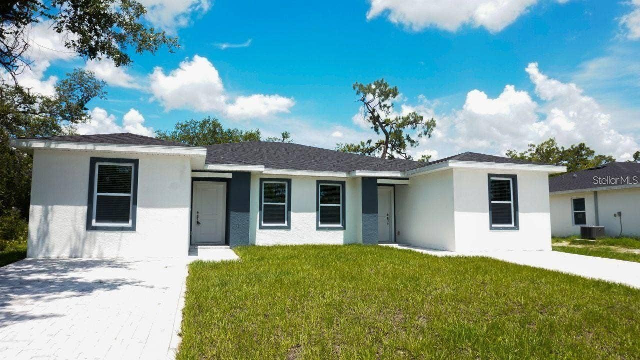 612 BLUEBILL COURT, Poinciana, FL 34759 Front exterior of 612 Bluebill Ct.