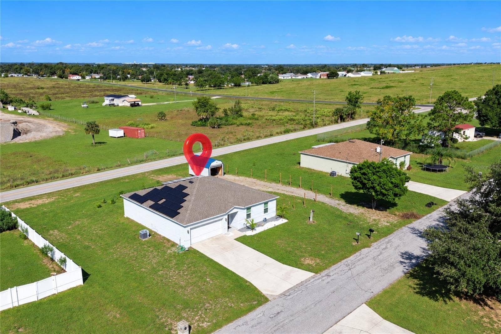 14 ROELS STREET, Haines City, FL 33844 Aerial view showcasing the property and its spacious lot.