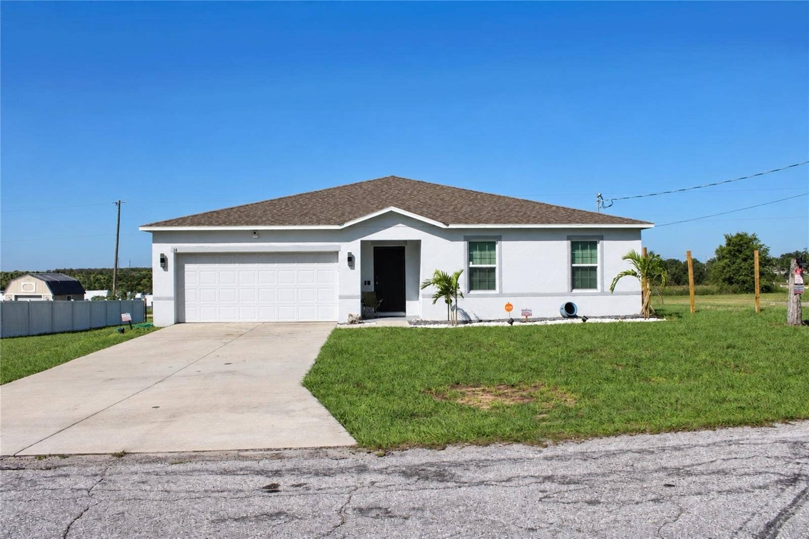 14 ROELS STREET, Haines City, FL 33844 Front exterior view of the home.
