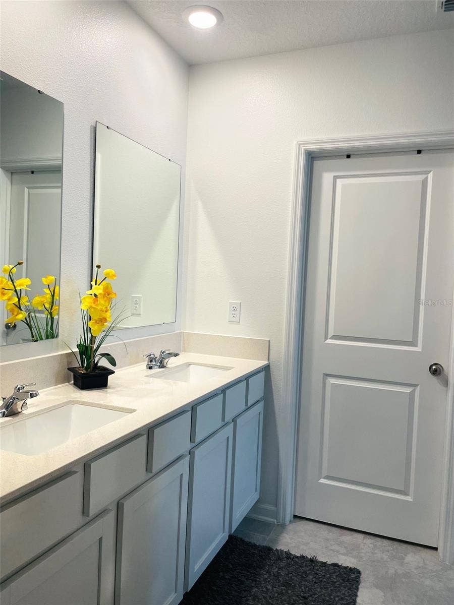 Primary Bathroom  Quartz Vanity w/ double sinks