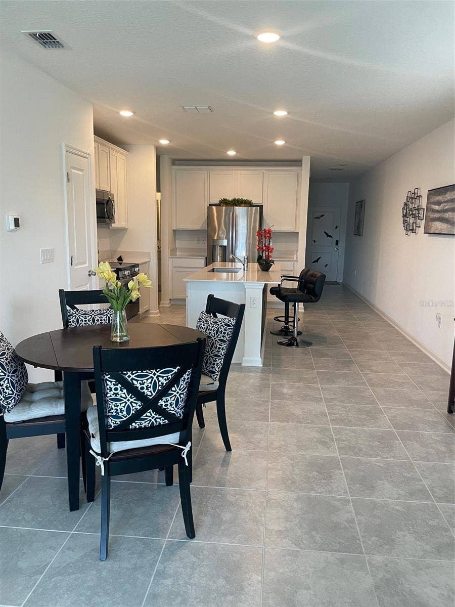 View from Living Room to Dining Area & Kitchen