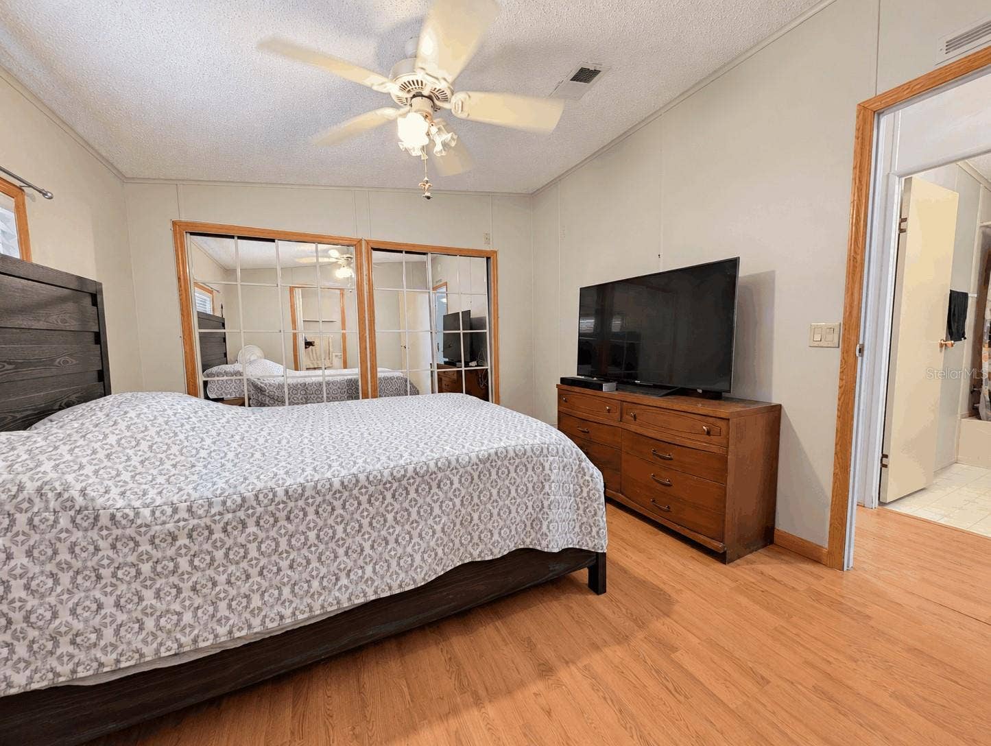 6066 SE SOUTHERN OAKS DRIVE, Winter Haven, FL 33884 Primary bedroom view from En-Suite Bathroom