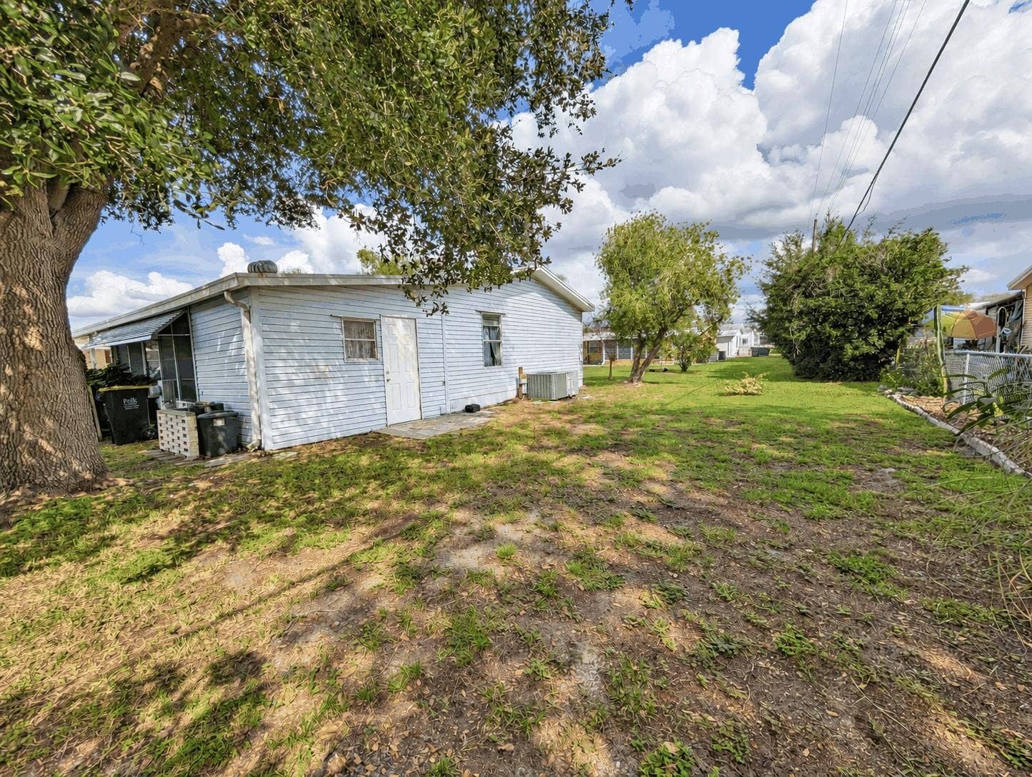 6066 SE SOUTHERN OAKS DRIVE, Winter Haven, FL 33884 Rear of House