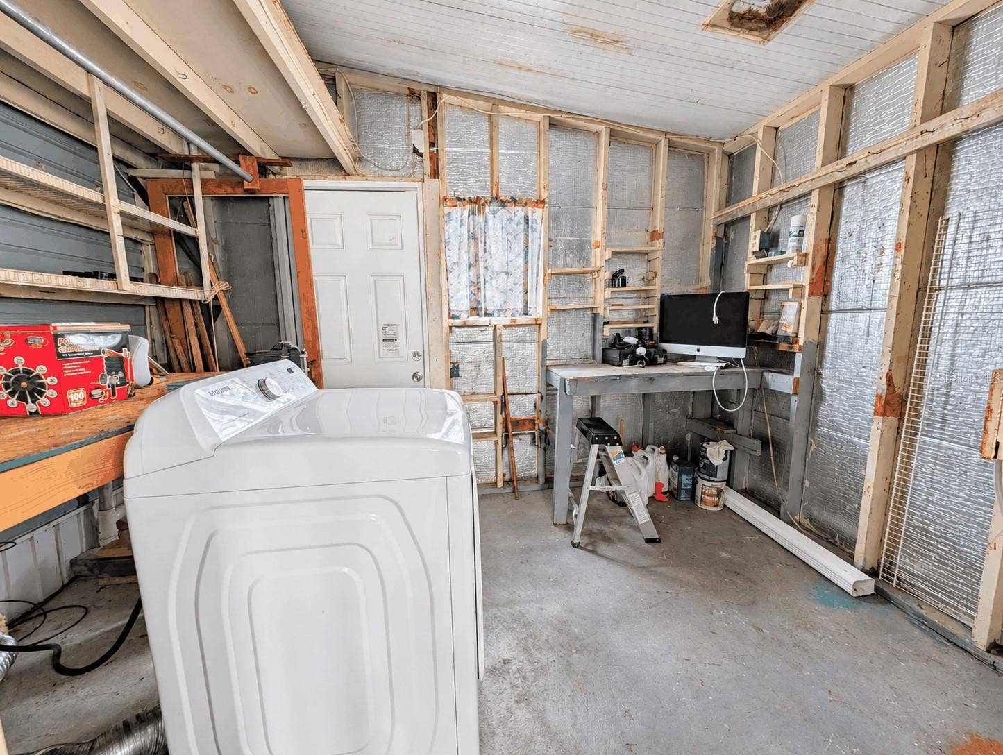 6066 SE SOUTHERN OAKS DRIVE, Winter Haven, FL 33884 Back storage room behind side screened porch