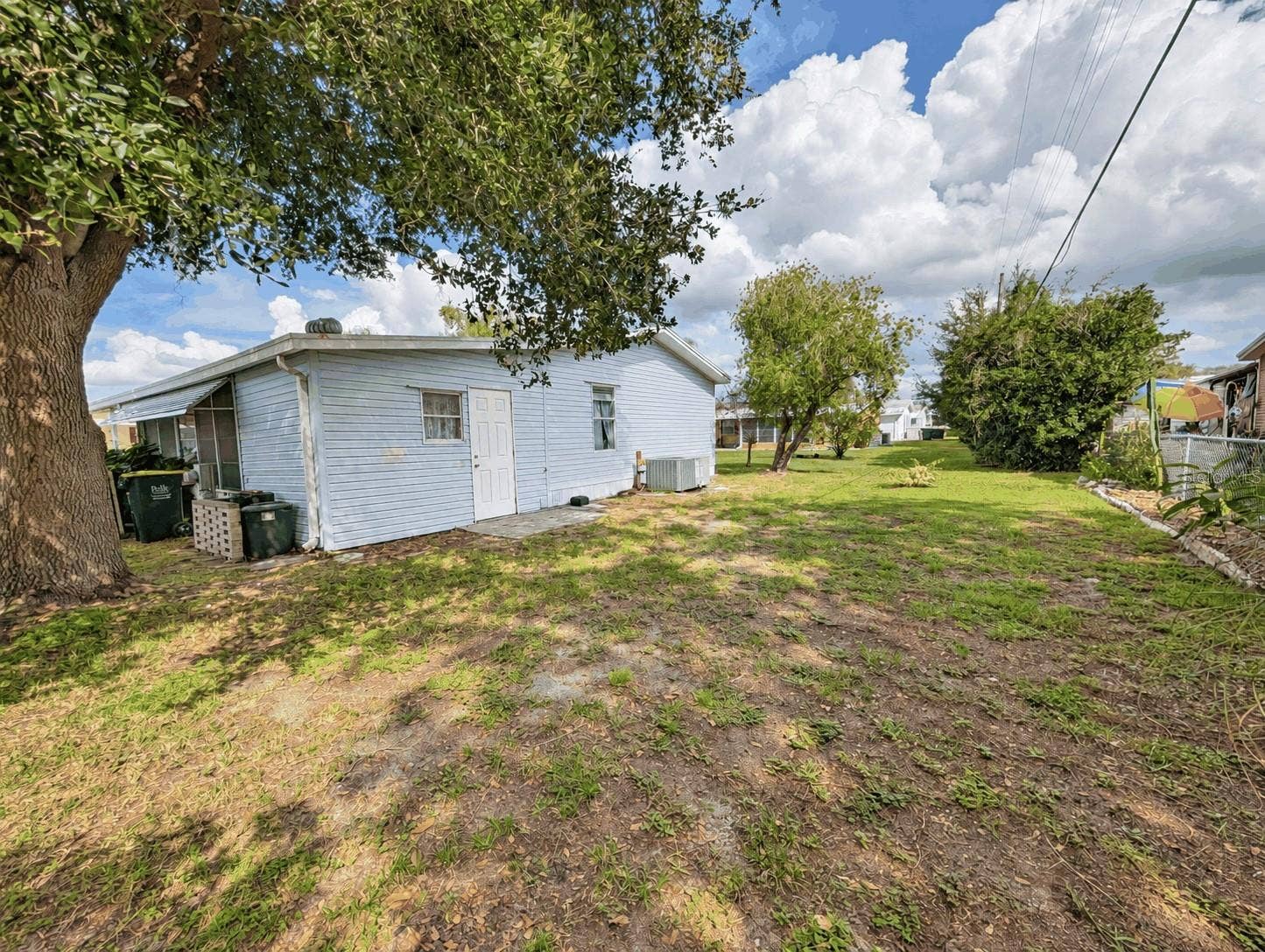 6066 SE SOUTHERN OAKS DRIVE, Winter Haven, FL 33884 Backyard
