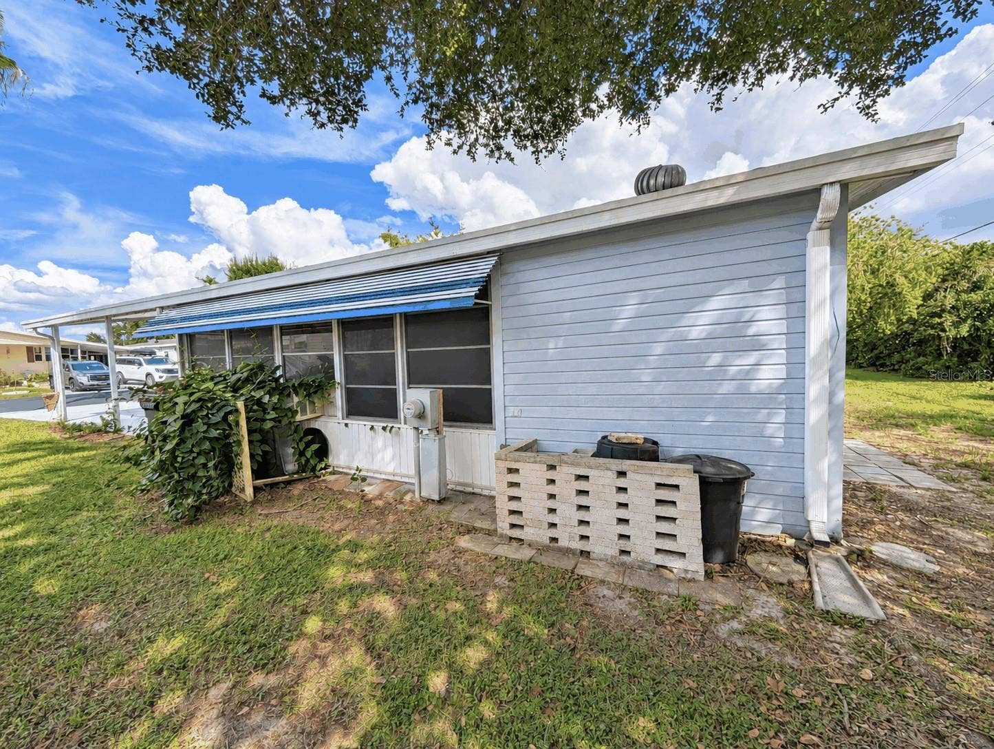 6066 SE SOUTHERN OAKS DRIVE, Winter Haven, FL 33884 Side of Home