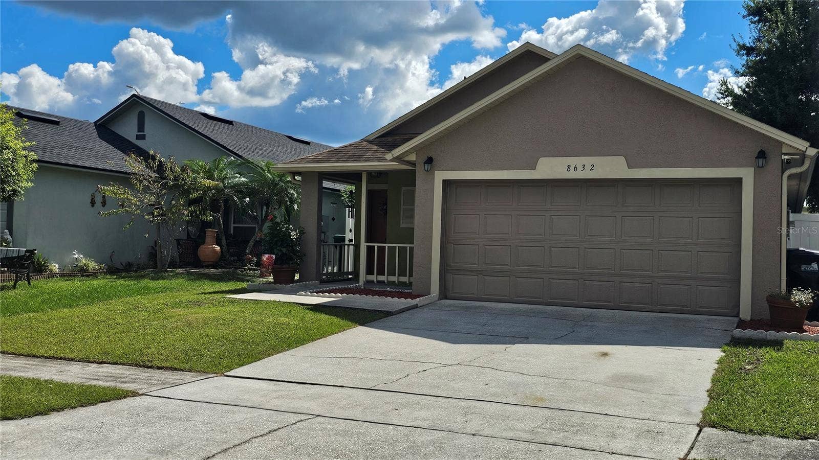 8632 FOLEY DRIVE, Orlando, FL 32825 Front Elevation & Garage
